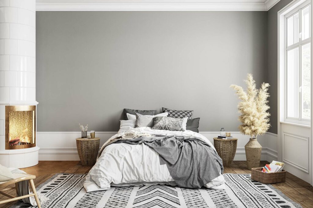 Black and white patterned area rug in a modern bedroom with hardwood flooring | Yetzer Home Store